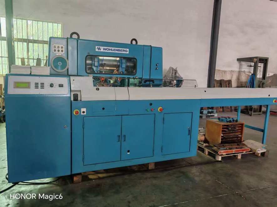 Three Knife Trimmer Wohlenberg TRIM-TEC560